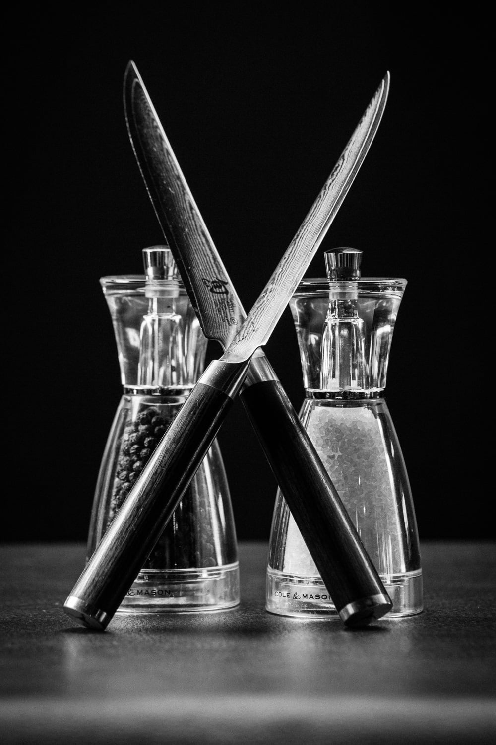Corporate Fotografie Meats Steakhouse schwarz weiss Salz Pfeffer Steakmesser