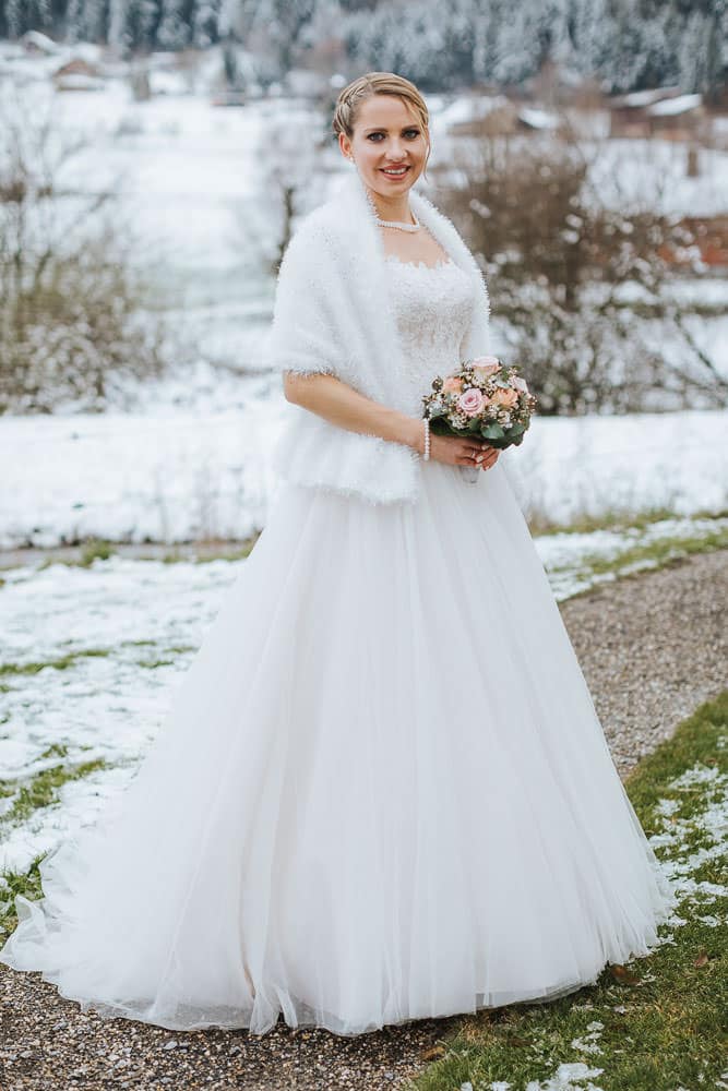 Hochzeitskleid Duchesse Stilrichtung Winter Pelz